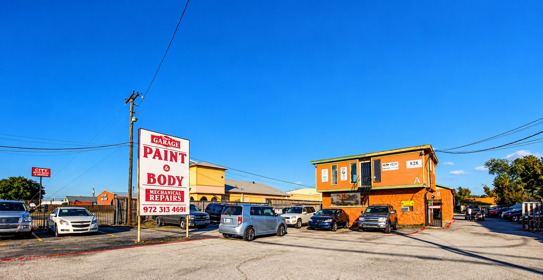 Angel's Garage paint, body and mechanical repair shop and car lot at 828 N Belt Line Rd in Irving
